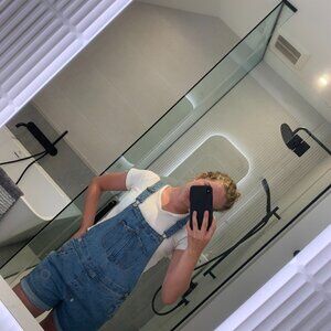 Jean overalls with white top